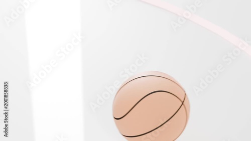 Dropping peach basketball rolling and rotating on glossy panel in studio, tracing pink motion trail