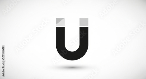 A simple black U-shaped horseshoe magnet icon with a subtle shadow.