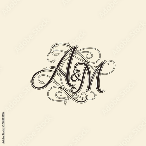 Elegant monogram lettering with floral design.
