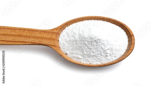 Baking soda in spoon.