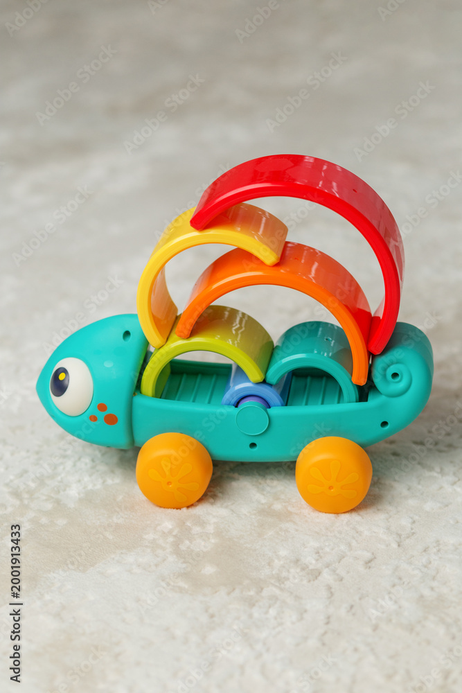 Obraz premium colorful baby toy turtle with stacking arches for toddler learning
