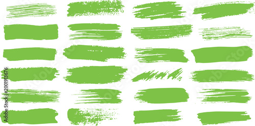 Collection of vibrant light green grunge paint brush strokes and dirty smears vector illustration set design elements.