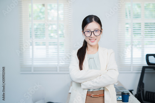 One Person Happy Asian Businesswoman Wearing Glasses Working In Office, Pretty Female Employee Using Modern Laptop
