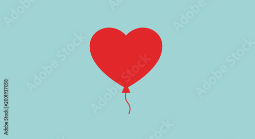 heart shaped balloon on light blue background