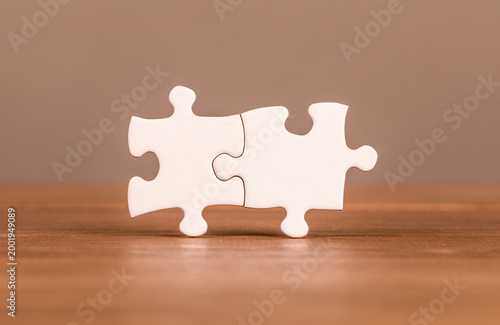 Close up shot of two jigsaw...