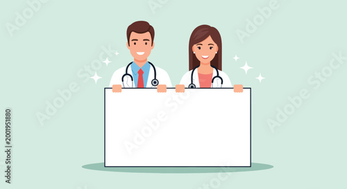 Male and female doctors holding a blank whiteboard sign.