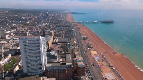 Aerial view of Brighton beach and pier with urban cityscape and sea
