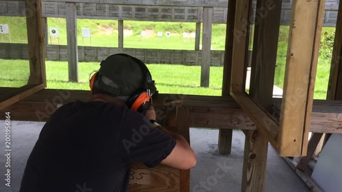 Man at shooting range with a rifle