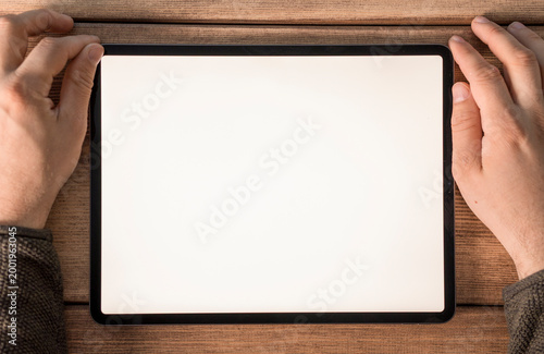Person using a tablet devic...