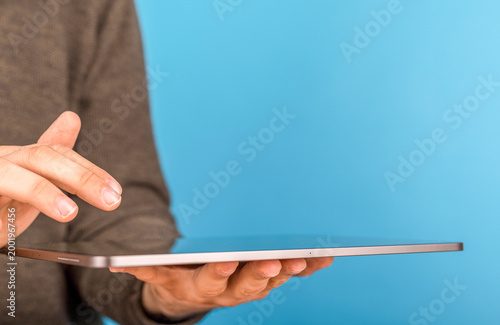 Person using a tablet compu...