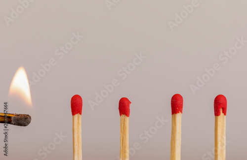 Burning match ignites match...