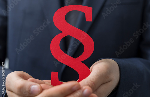 Person holding paragraph si...