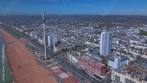Diagonal aerial flight over Brighton beach front with skyscraper and i360 tower