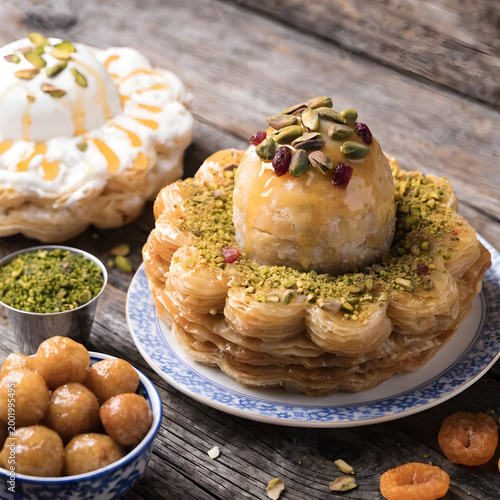 traditional eastern desserts on wooden background