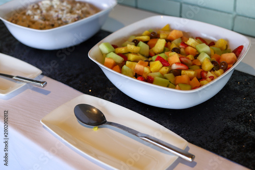 Obraz na plátně A bowl of fresh fruit at a catered event
