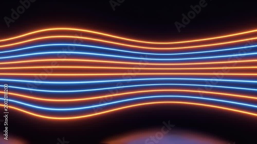 Wavy lines of vibrant orange and blue light illuminate a dark background, creating an abstract visual effect.