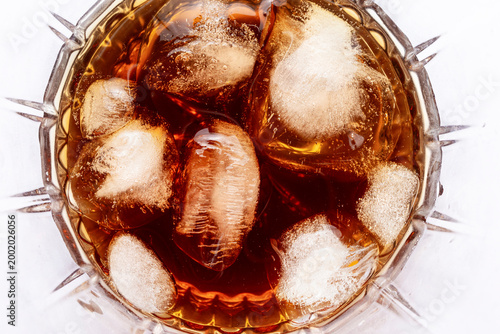 Top View Whiskey With Ice Cubes In Crystal Glass