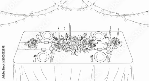 Elegant dining table setting with floral centerpiece and string lights