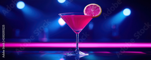 Vibrant Pink Cocktail with Lemon Slice on Bar Counter at Night