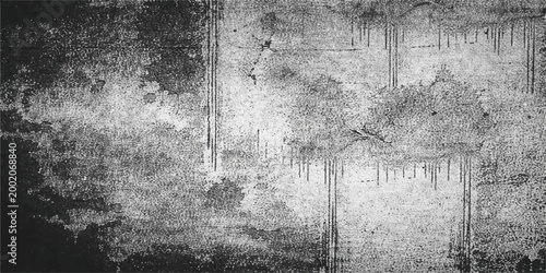 An old dark grey concrete wall background with a grunge texture pattern featuring abstract black and white winter forest trees in a cold snow landscape
