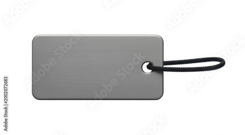 Rectangular grey metal luggage tag with a black cord loop isolated on a white background