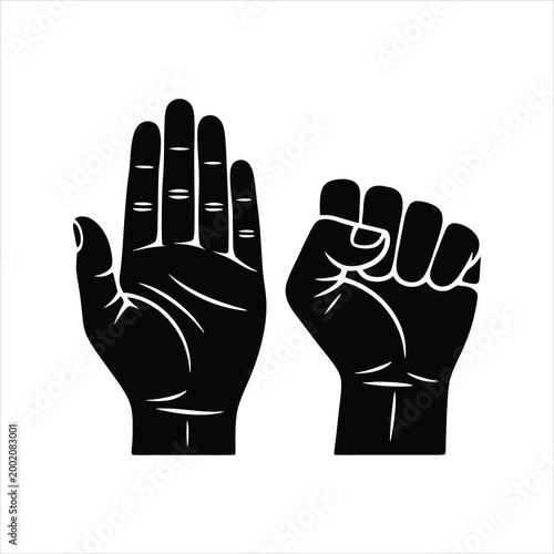 Black silhouette of an open hand and a clenched fist
