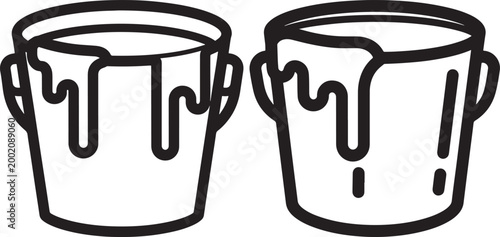 Two paint buckets with paint dripping down their sides indicating painting or renovation activity paint bucket home improvement art supplies house painting do it yourself craft supplies