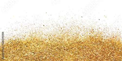 Shiny gold glitter particles falling in a festive shimmering pile on the floor for celebration background