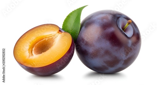 Plum fruit with green leaf on white background