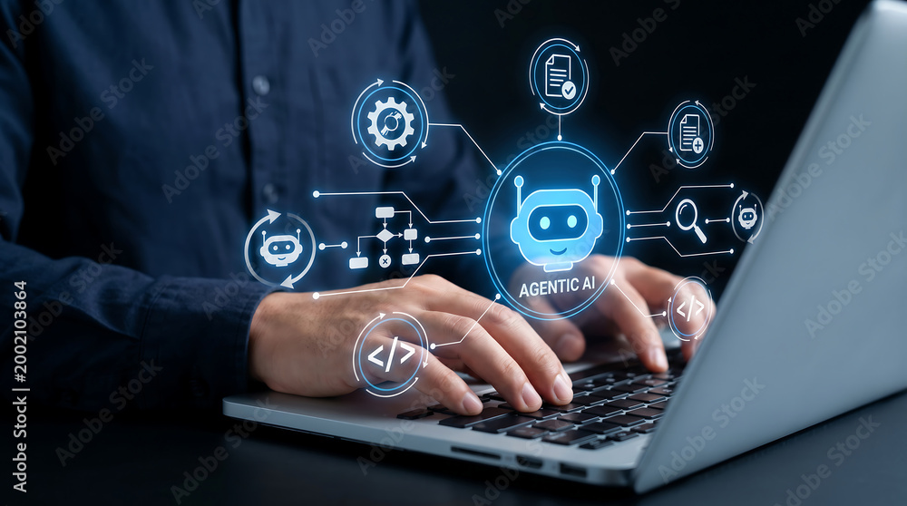 Fototapeta premium Software developer using laptop with glowing agentic artificial intelligence interface showing autonomous task flow and code generation symbols in dark professional office environment