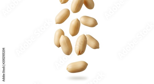 Pine nuts falling in air, isolated on white background