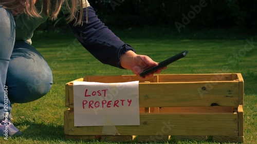 Woman gets lost cellphone from lost property box