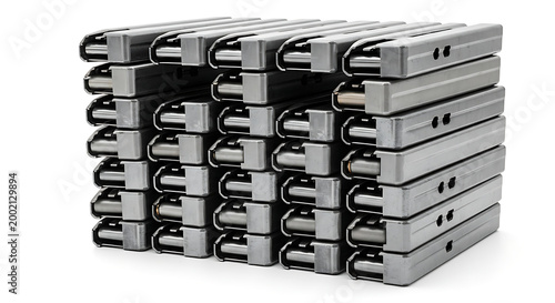 Neatly stacked metallic industrial components forming a large, organized structure, isolated