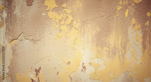 Weathered wall texture with peeling paint and cracks
