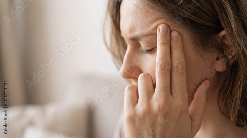 Stressed Woman Suffering From Severe Tension Headache