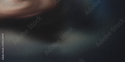 Abstract art piece with dark colors and blurry textures