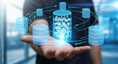 Man holding glowing holographic database icons showing data integration process. Concept of warehouse pipeline, storage migration, and system mapping network.