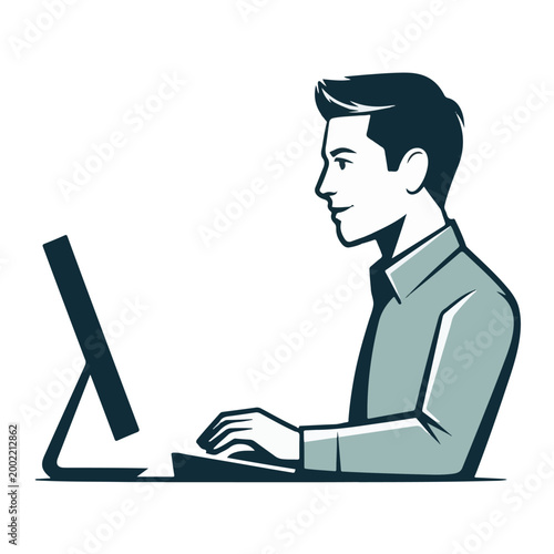 Male office worker typing on computer at desk