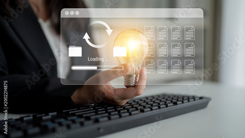 Fotografía File synchronization or loading interface with progress bar, folders, and docume
