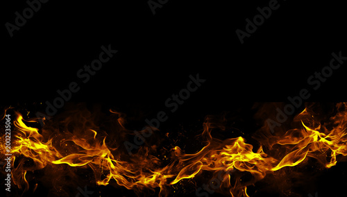 Bild auf Leinwand Fire line flame effect horizontal burning border on a black background