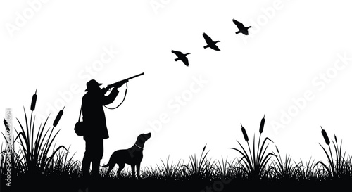 Silhouette of a hunter aiming his shotgun at flying ducks with his dog beside him