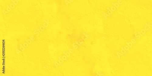 Vibrant yellow textured background with abstract stucco plaster effect and bright sunny matte finish for creative design