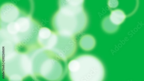 Initial orbs appearing discs drifting in clumping overlapping showing light bloom on transparent