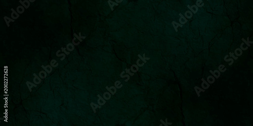 Fotografi Dark teal textured stone background with subtle cracks, moody deep green marble