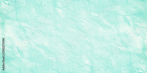 Light teal marble texture background with soft white veins and ethereal crumpled paper effect for elegant web design