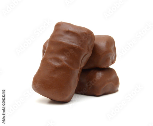 Foto Chocolate candy isolated on white background