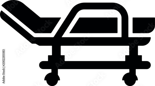 Medical stretcher icon simple black silhouette of a hospital gurney on wheels representing emergency transport and healthcare services