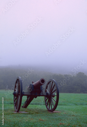Film photo of Civil War cannon in foggy battlefield