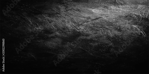abstract texture: A dark and enigmatic textured background. Evoking depth and mystery, this image is ideal for adding a touch of sophistication to design. 