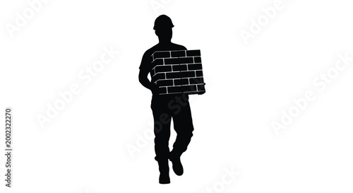 Man in a hard hat carrying a brick wall as a construction worker walks alone